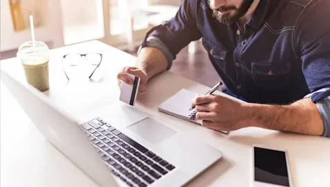 person making online purchase