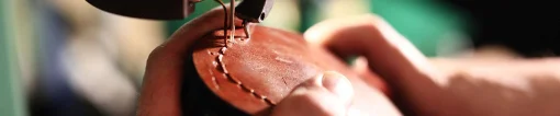 Shoe sole being stitched