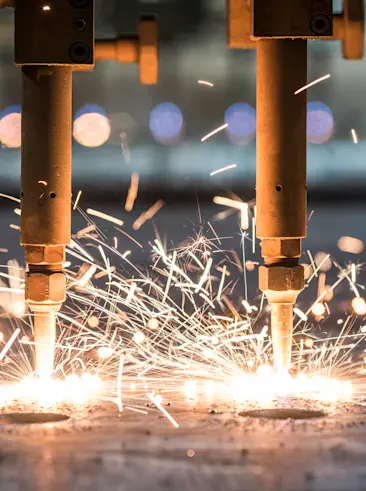 Laser cutters on metal sheet