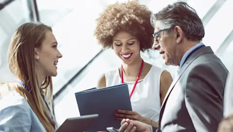 three people talking