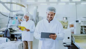 sterile man looking at tablet
