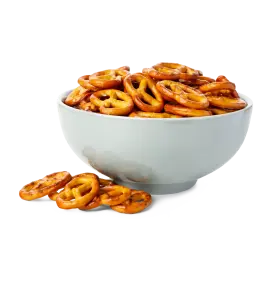 White ceramic bowl containing salted mini pretzels