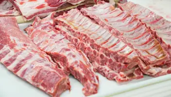 Ribs on a cutting board.