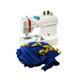 Een naaimachine en een stuk blauwe stof