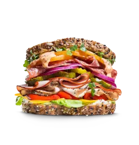 Sandwich stacked with toppings.