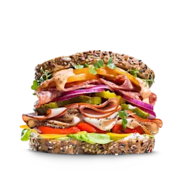 Sandwich gestapeld met toppings.