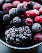 Assortment of frozen berries in a bowl