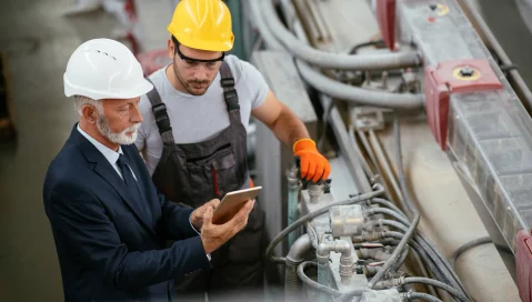 two workers on shop floor