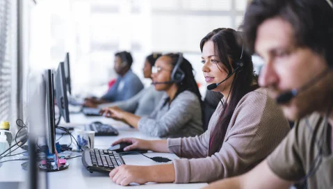 Call center with people on headsets
