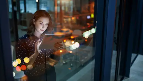 Woman using touchscreen tablet