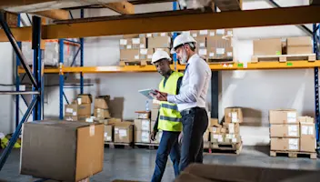 Men in warehouse