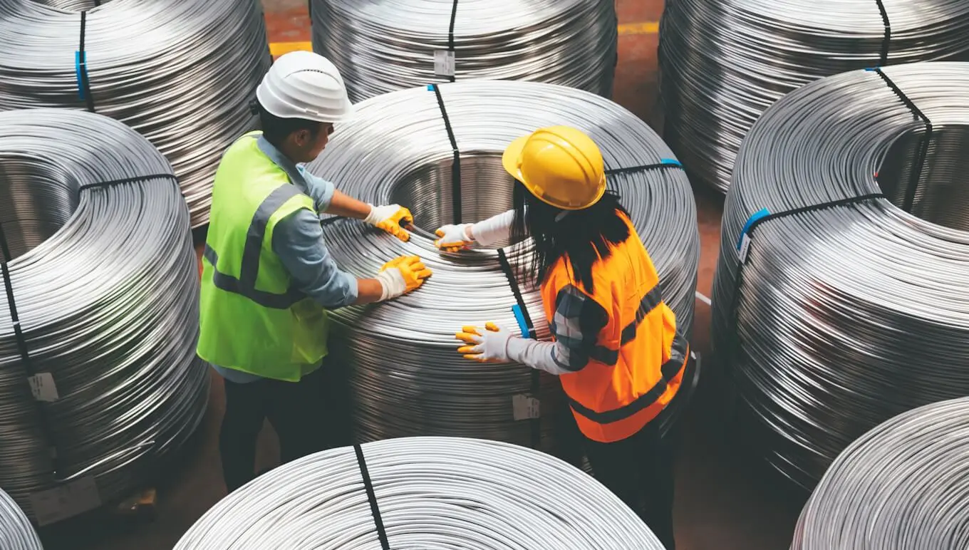 2 workers in a factory.