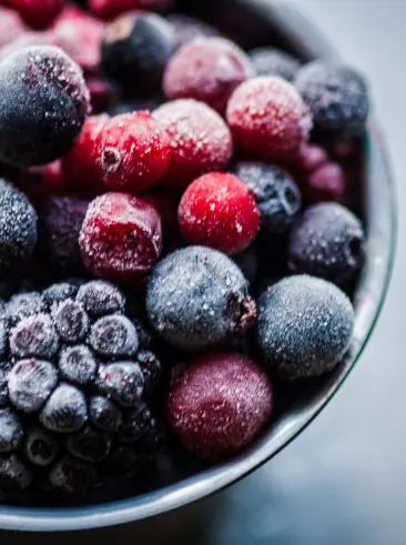 A bowl of frozen berries