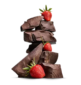 Stacked fudge blocks with strawberries.