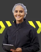 Woman in hairnet holding tablet