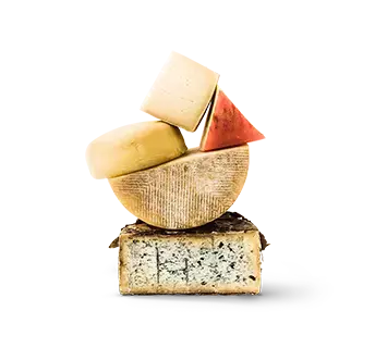 Stack of aged cheeses in different shapes.