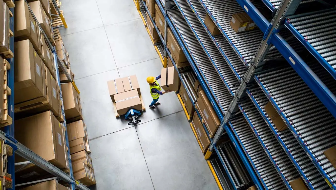 Warehouse worker with box