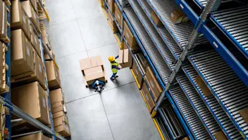 Warehouse worker with box