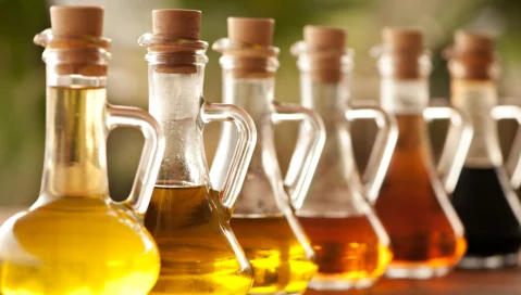 Various cooking oils in glass bottles.