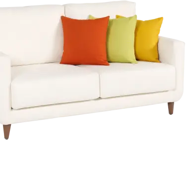 White couch with 3 colorful pillows