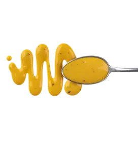 Sauce jaune sur une cuillère