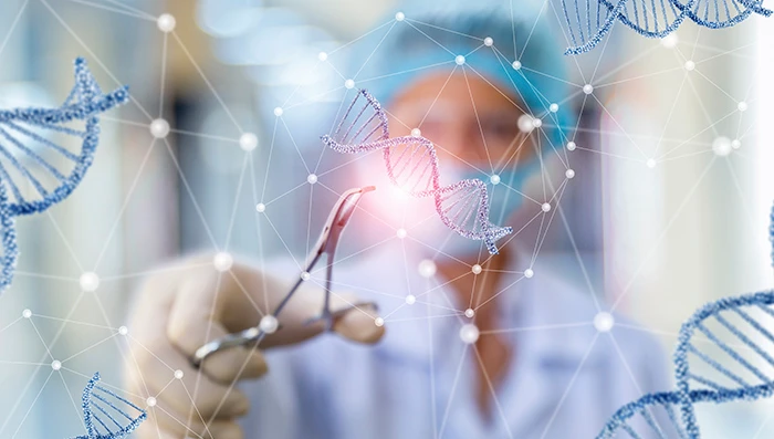 Scientist using tweezers on a strand of DNA