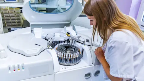 Woman looking at samples in a lab