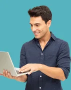 Man looking at laptop while holding it