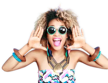 Fashionable woman facing forward and smiling