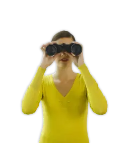 Woman looking through binoculars