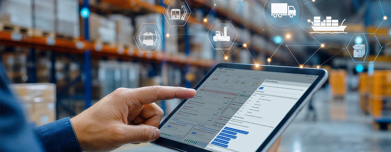 Finger points at tablet showing SCM fulfillment product UI.