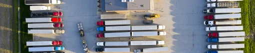 Trucks in parking lot depot
