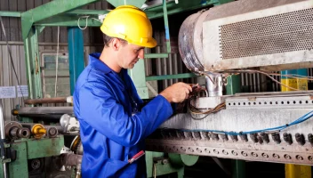 Industrial mechanic repairing equipment