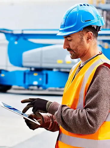 Equipment worker on tablet