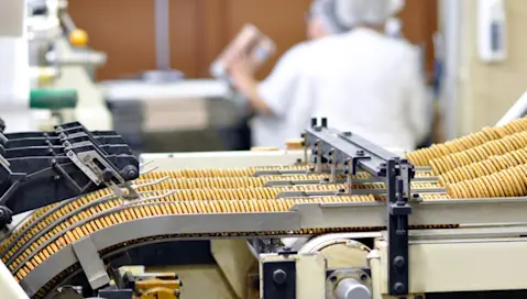 Cookies move along a conveyer.
