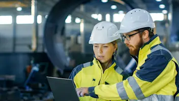 Man and woman on shop floor