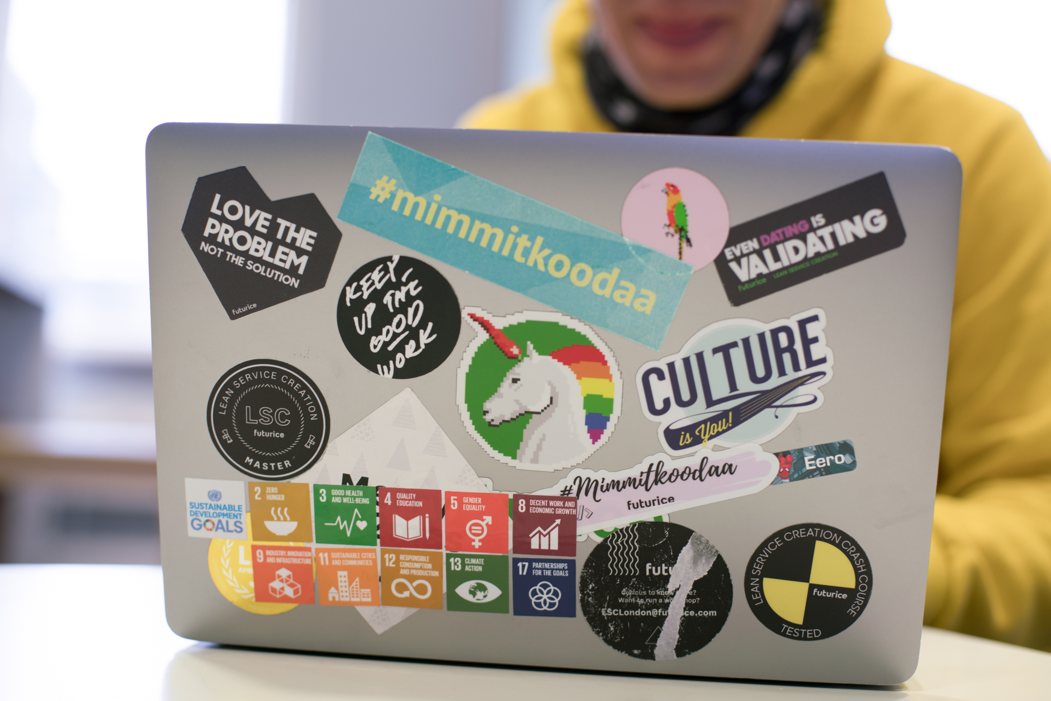 un-sdg-stickers-on-laptop