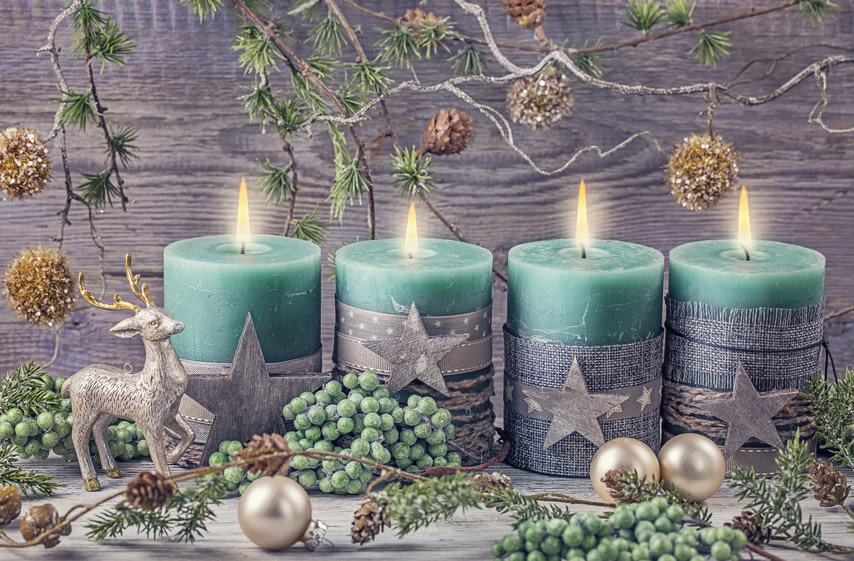 Four green christmas candle
