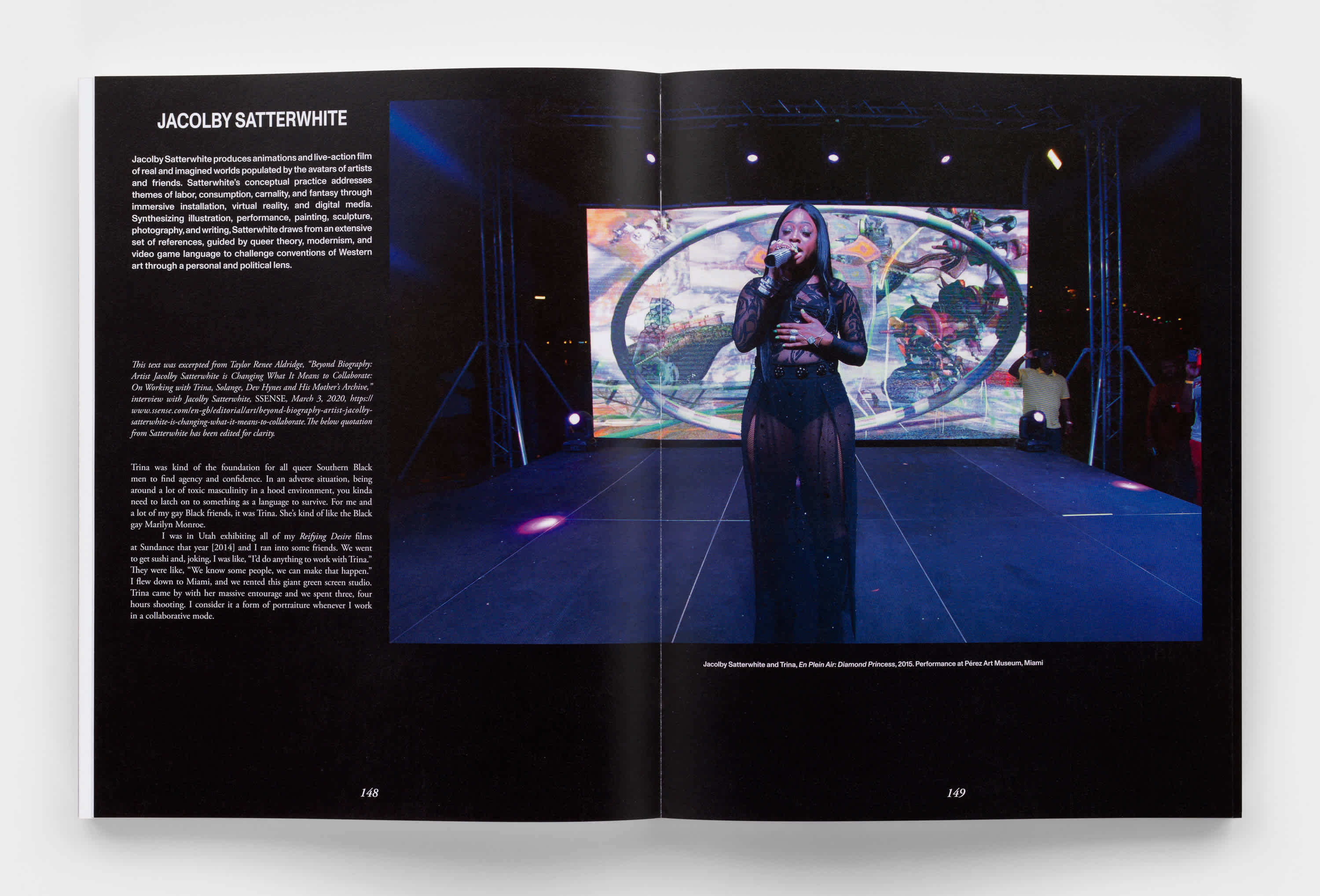 Open book with a single column of white text on the left page and a photo of a woman singing on stage on the right page.