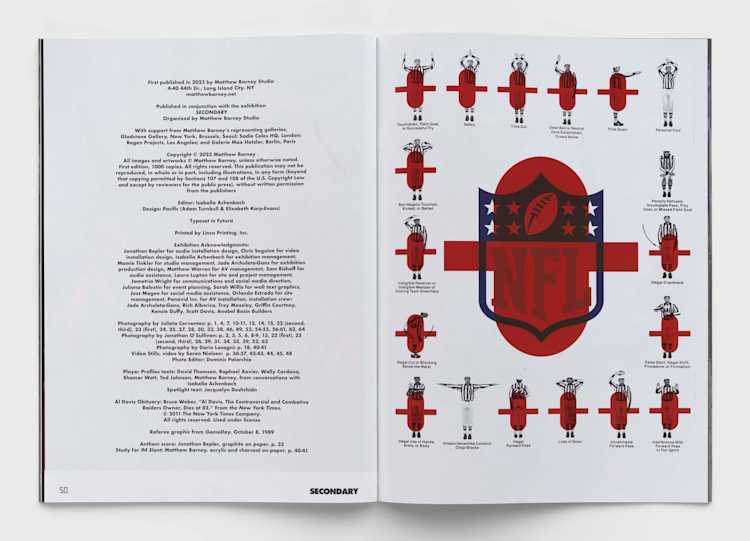 Image of an open book on a grey background.