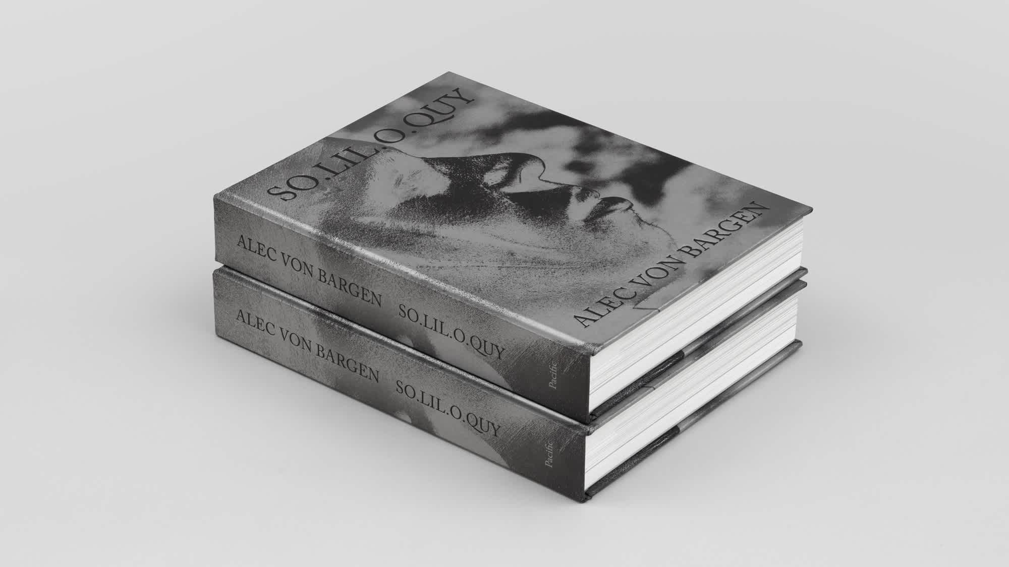 Stack of two large hardcover books. The front cover and spines are visible.