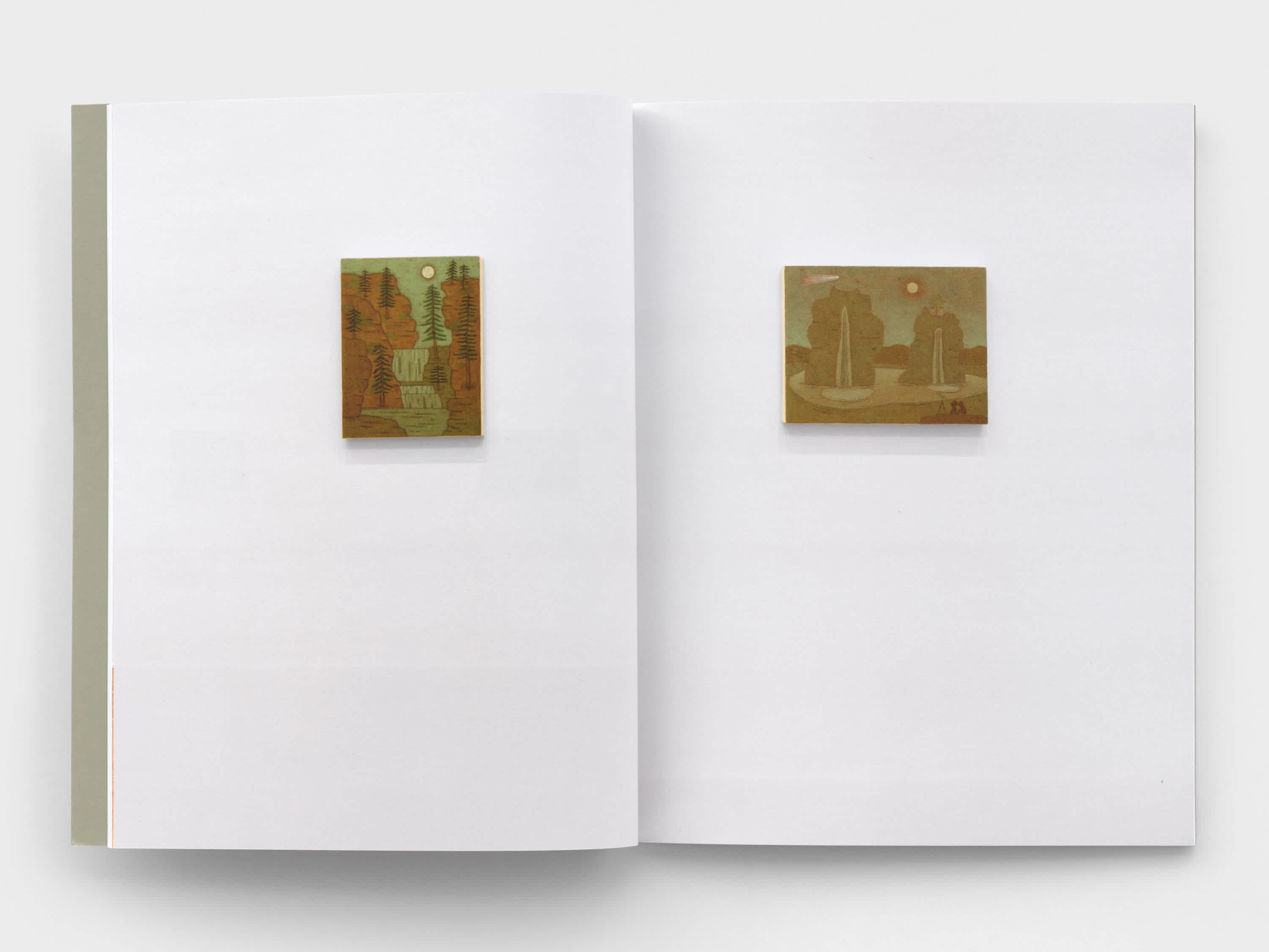 Open book with a small earth-tone landscape painting on both pages.