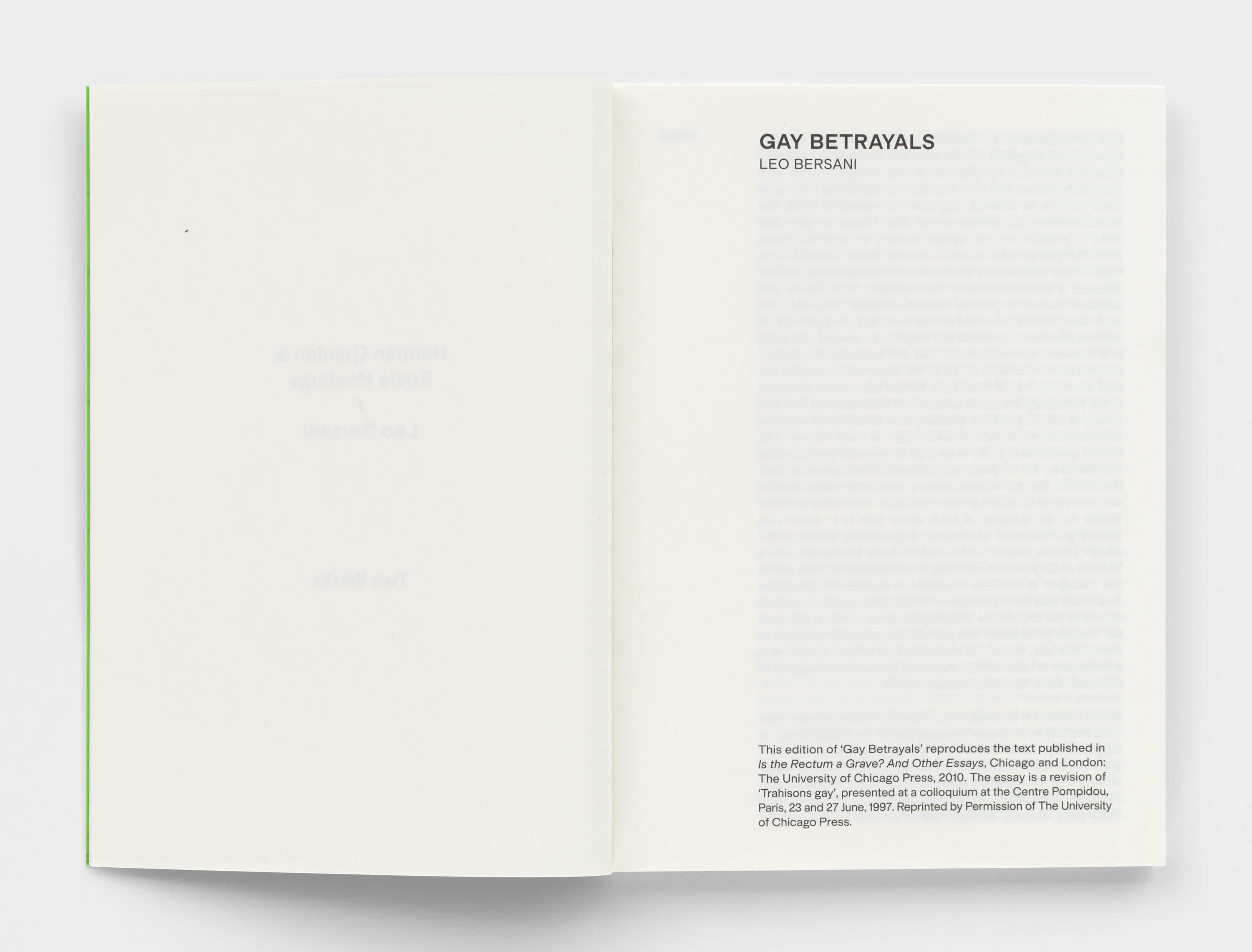 Open book with blank left page and text on the right page.