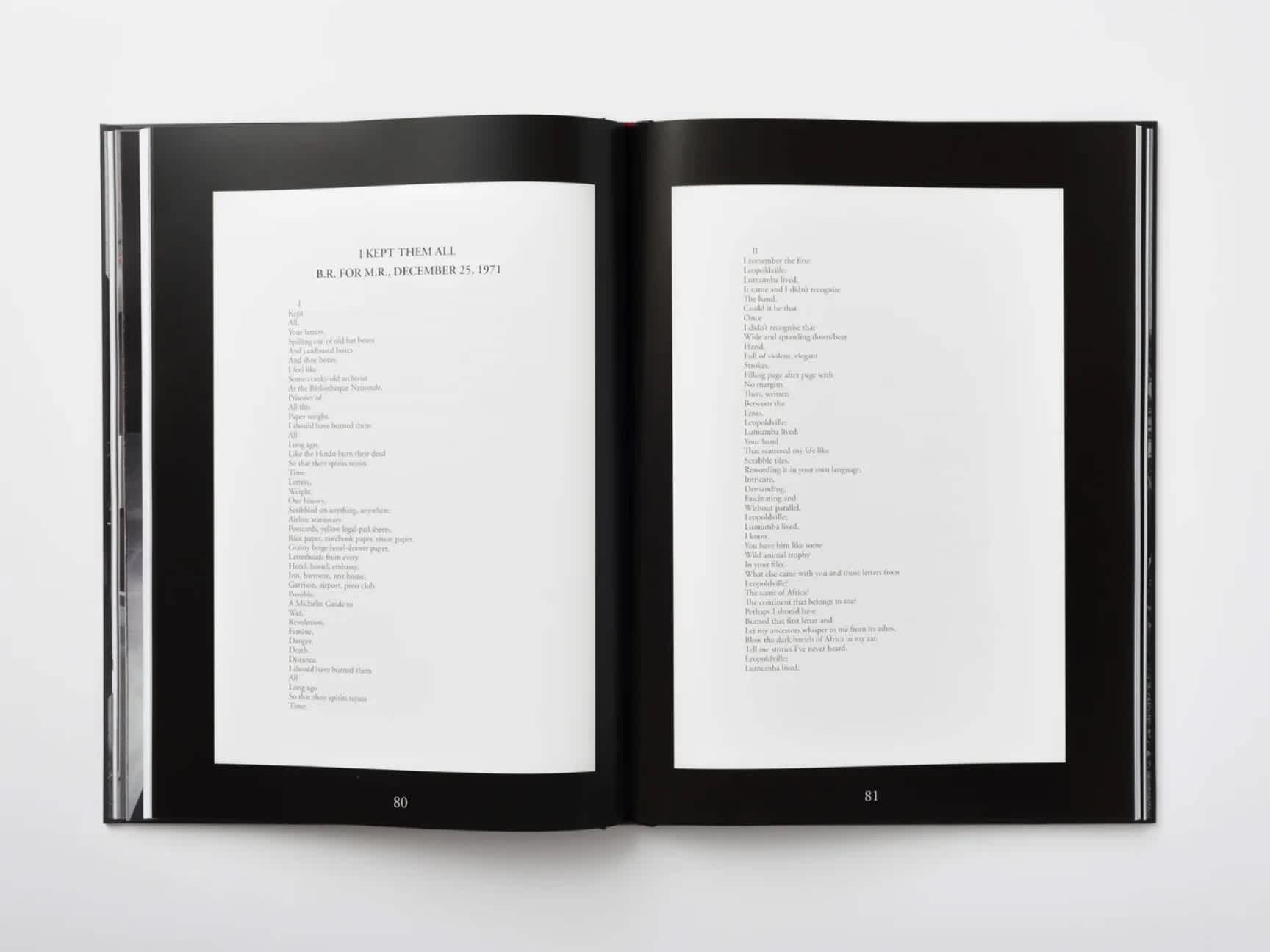 Two pages of a poem on either side of an open book. Both poem pages sit on black backgrounds.