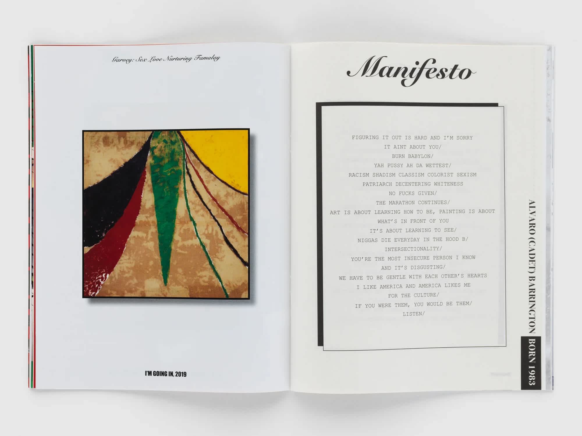 Open book with a colorful artwork on the left page and a typed manifesto on the right page.