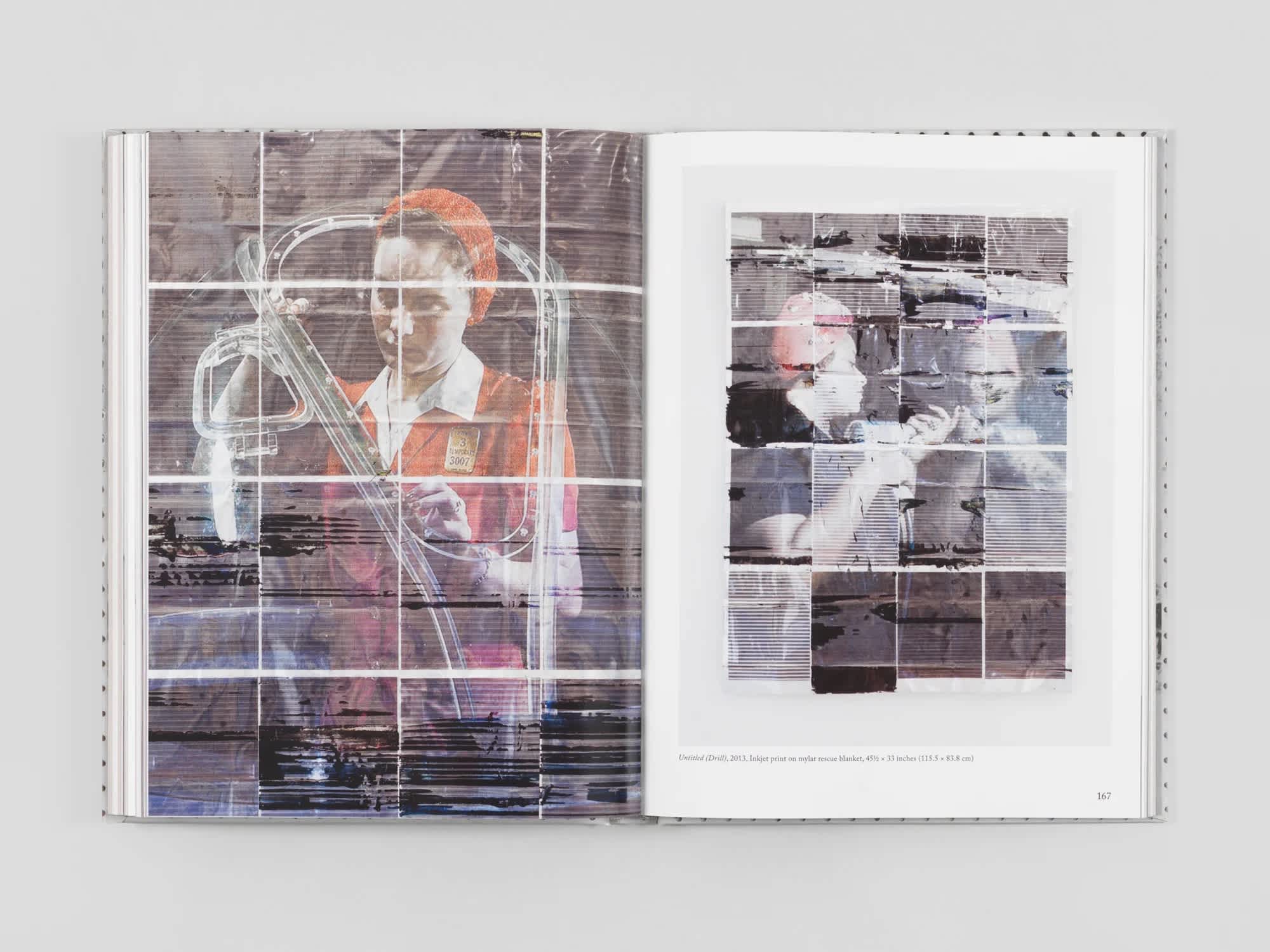 Open book with artworks on both pages.