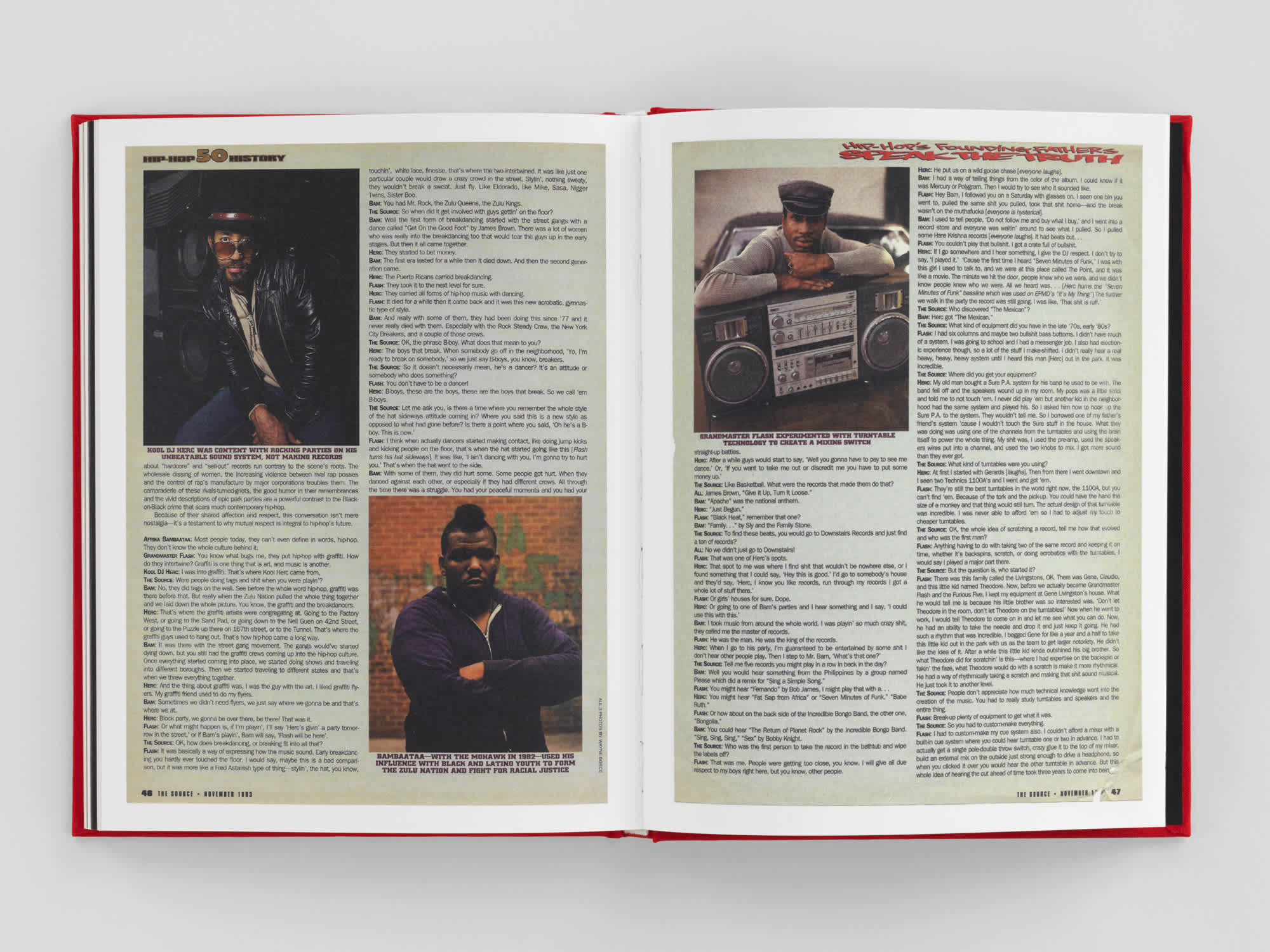 Two page, open book. Left page features two portraits in opposite corners, transcript from in interview fills the other two corners. Right page features on portrait of a man leaning on an 80s boombox in the top left corner. The rest of the page is an interview transcript.