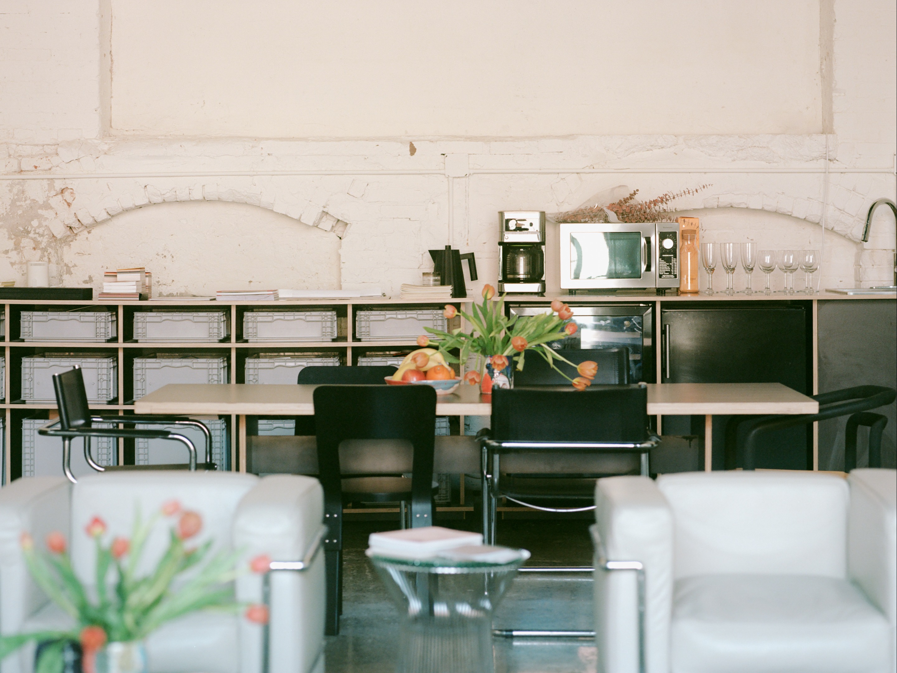 Sleek studio space with large screen monitor computers