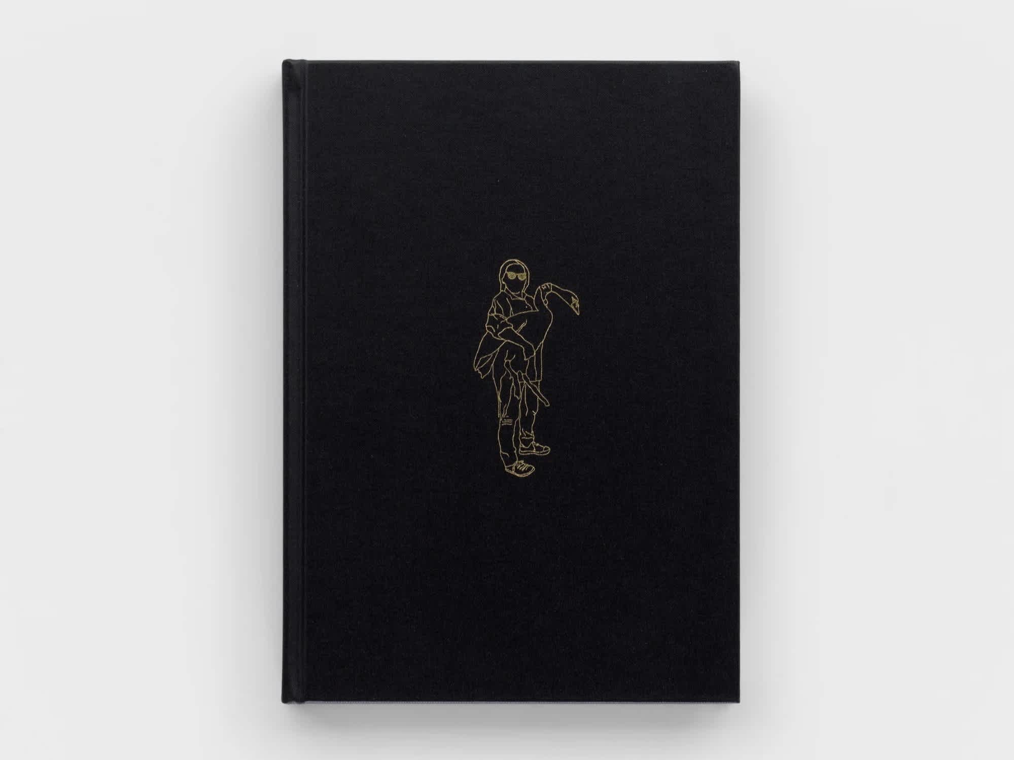 Black book cover with a gold embossed drawing of a person holding a flamingo.