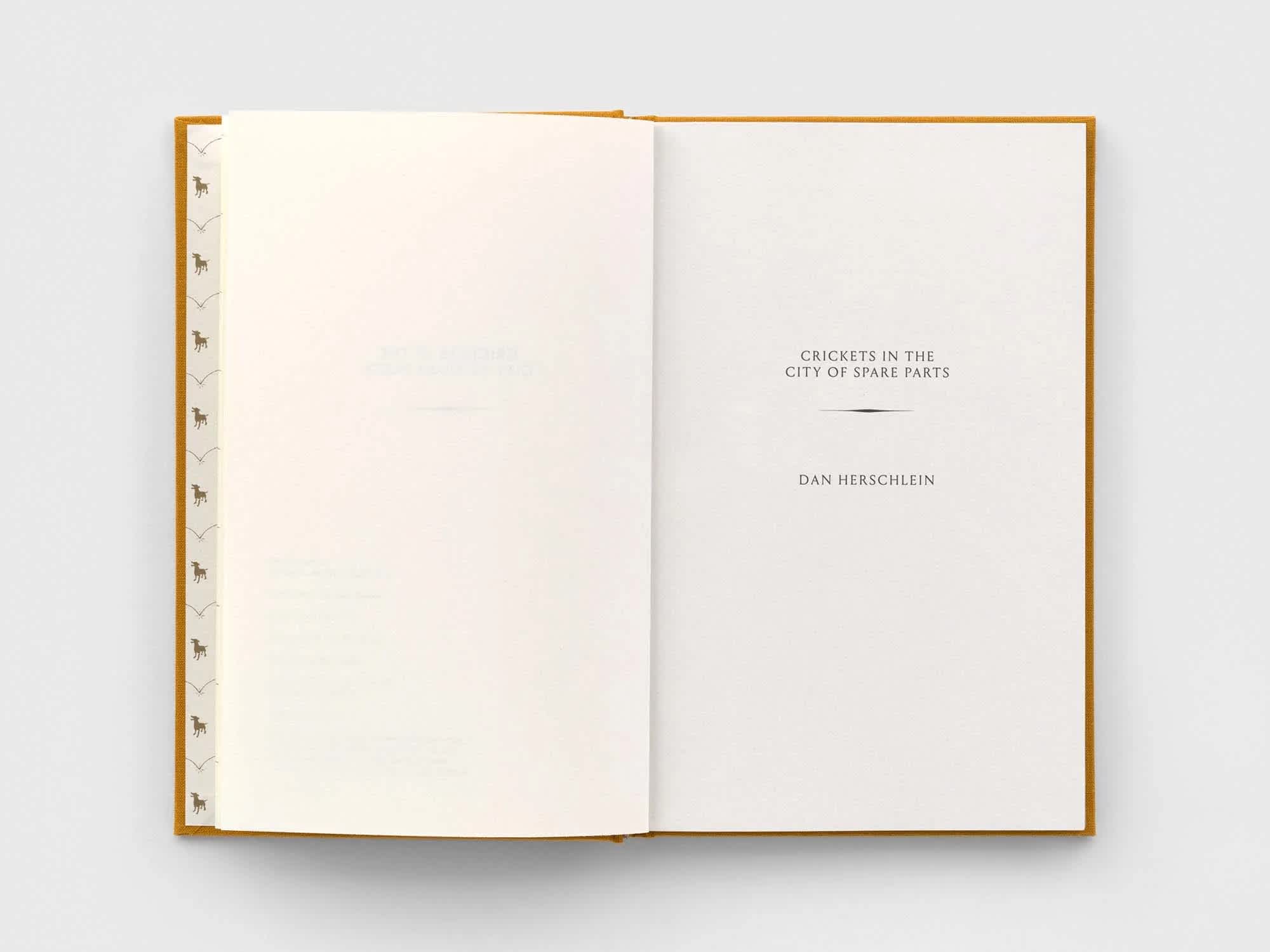 Open book with a blank left page. The right page has text in the center.